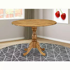 Table à manger en bois d'acacia offrant une texture boisée avec deux rallonges abattantes de 23 cm