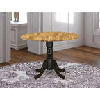 Table à manger en bois d'acacia offrant une texture boisée avec deux rallonges abattantes de 23 cm