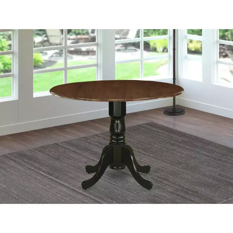 Table à manger en bois d'acacia offrant une texture boisée avec deux rallonges abattantes de 23 cm