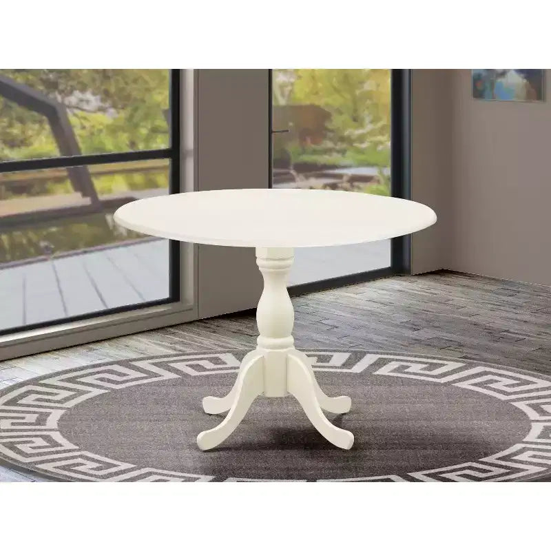 Table à manger en bois d'acacia offrant une texture boisée avec deux rallonges abattantes de 23 cm